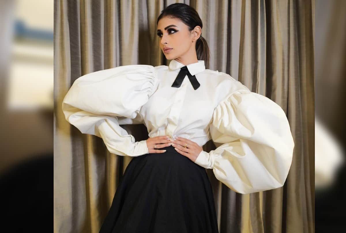 Stylish Look Of Mouni Roy Carrying Wolf Wing White Shirt With Black Skirt