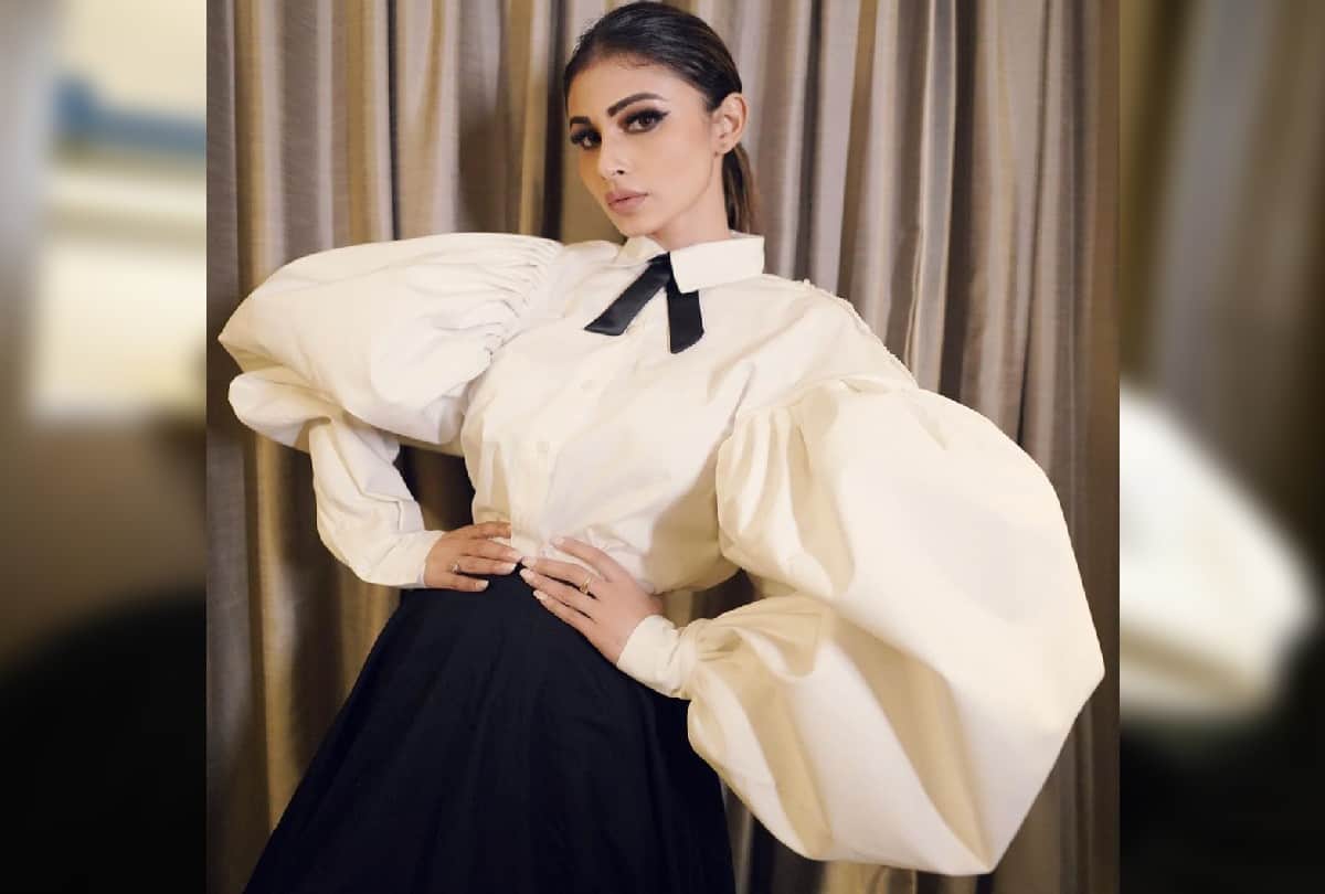 Stylish Look Of Mouni Roy Carrying Wolf Wing White Shirt With Black Skirt