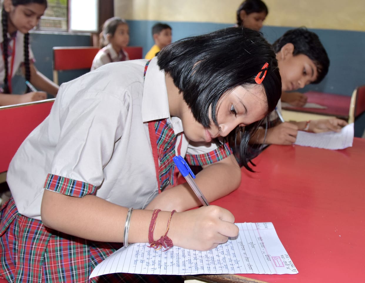 Students showed writing talent in Hindi calligraphy competition