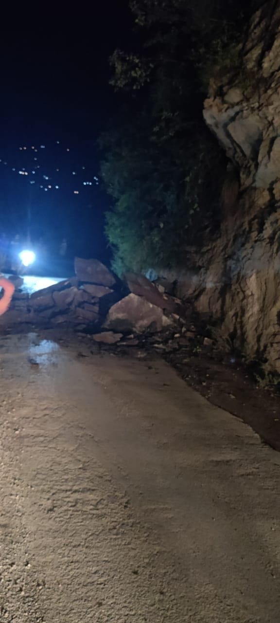 land slidine on road