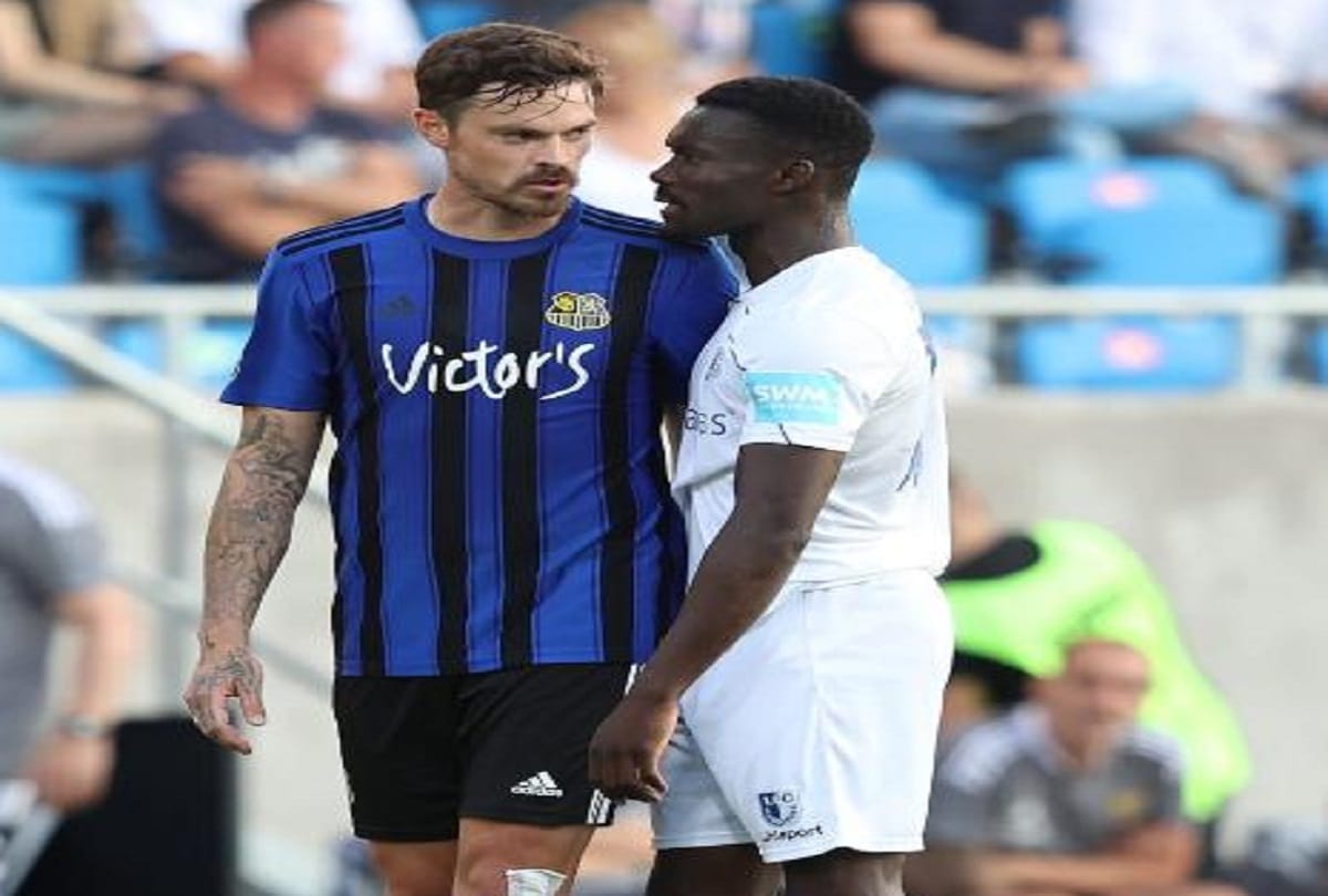 German footballer Dennis Erdmann was found racially abused opposing players during a third division game banned for eight weeks