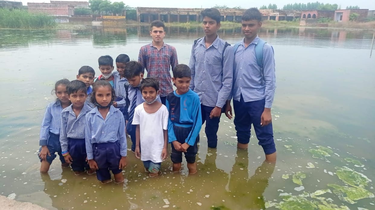 children are unable to practice the water filled in the playground of the area school