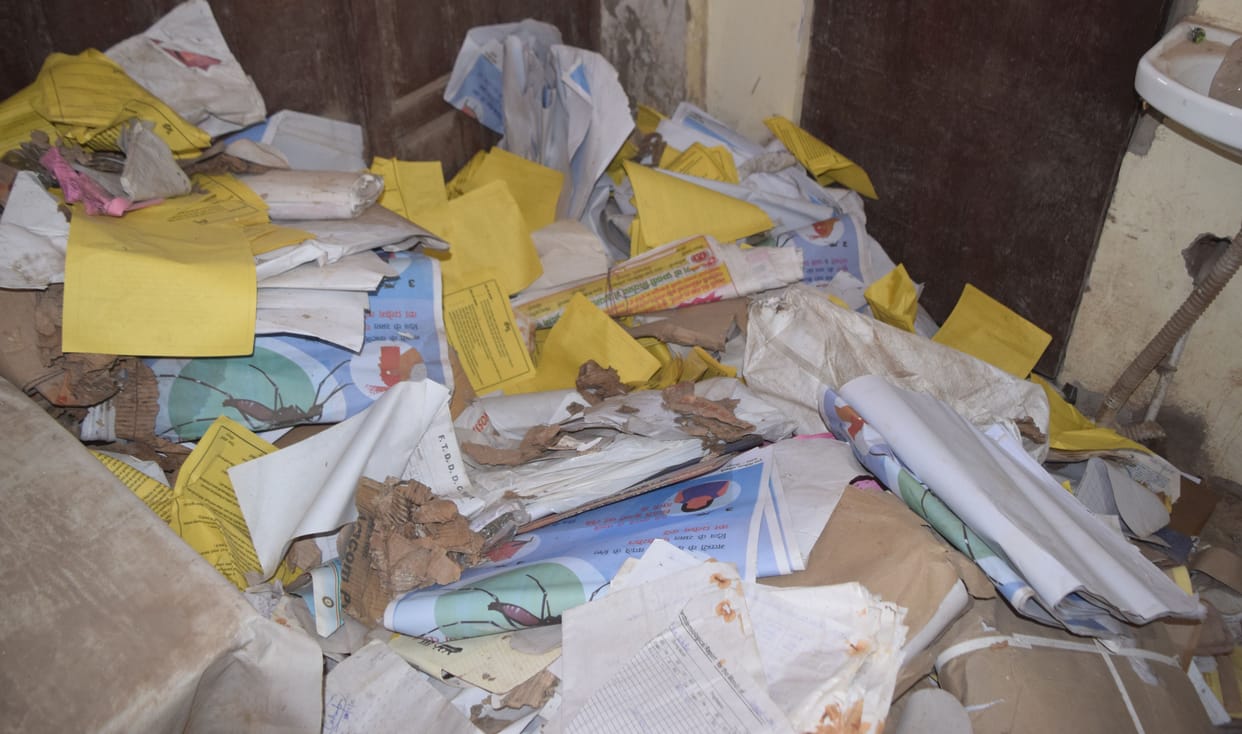 Dengue and malaria posters gathering dust