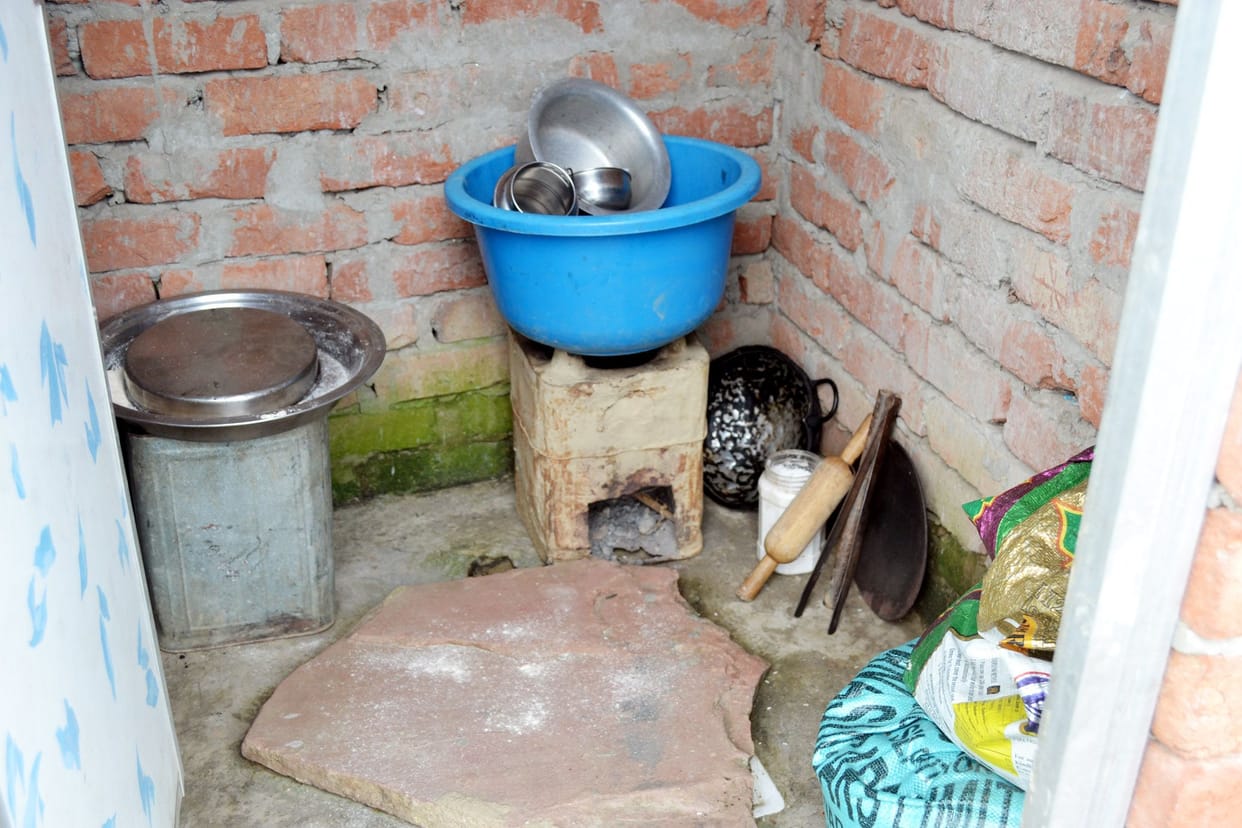 Toilet used as kitchen