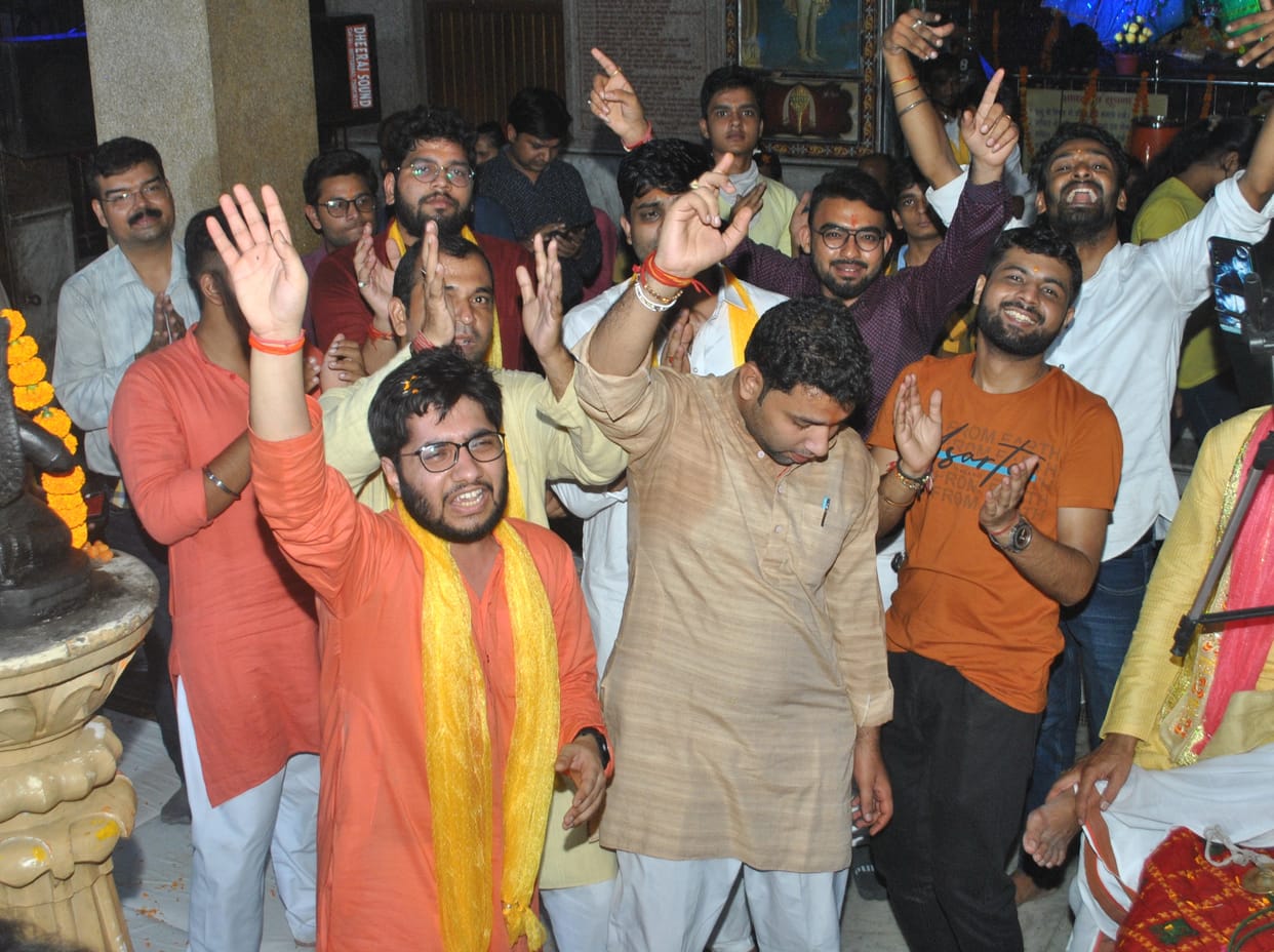 Devotees dance in Bhajan Sandhya on Radhashtami
