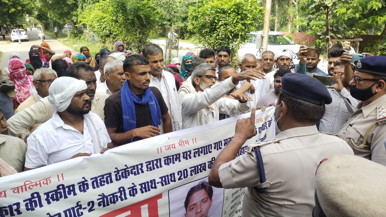 Relatives of the youth who died in a bike collision while catching an unclaimed animal demonstrated for compensation