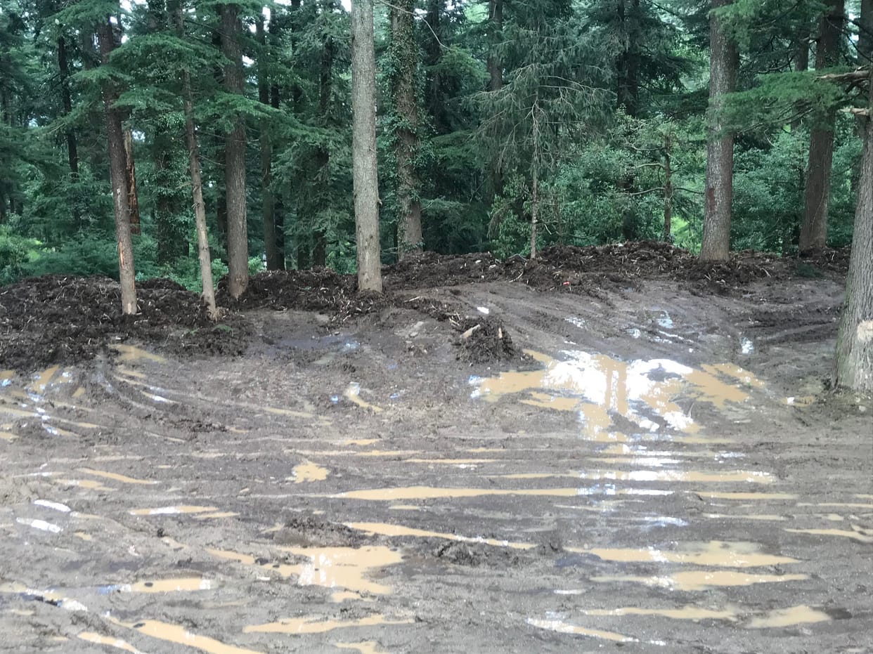 Parking became swamp in Khajjiar, Tourists are finding it difficult to move on the mud filled in the parking lot.