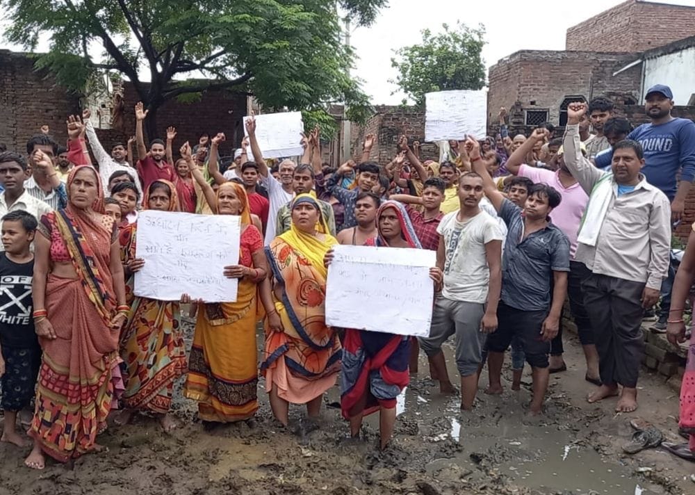 People of Tharputha sitting on dharna demanding development works