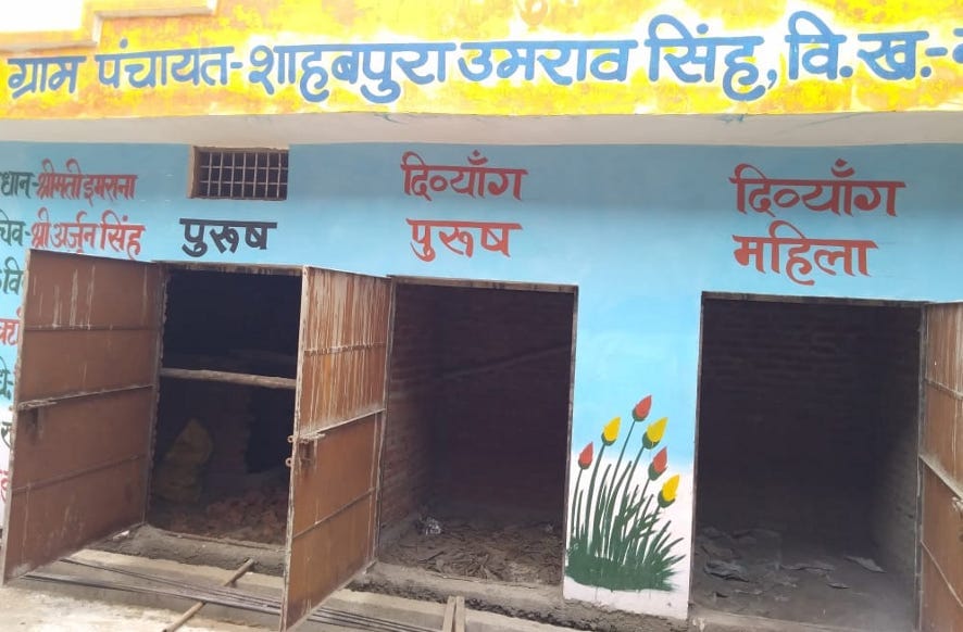 Painting done from outside, toilet lying incomplete from inside