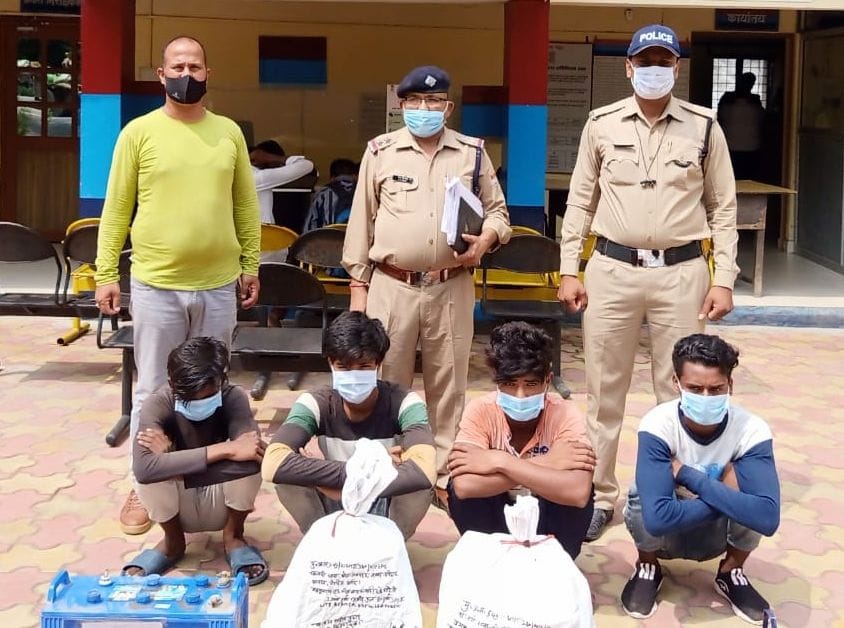 Four arrested for theft from warehouse