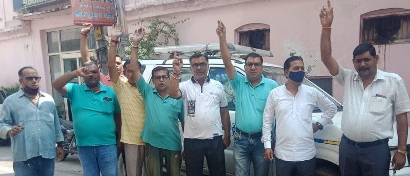 Travel businessmen demonstrated by parking their vehicles