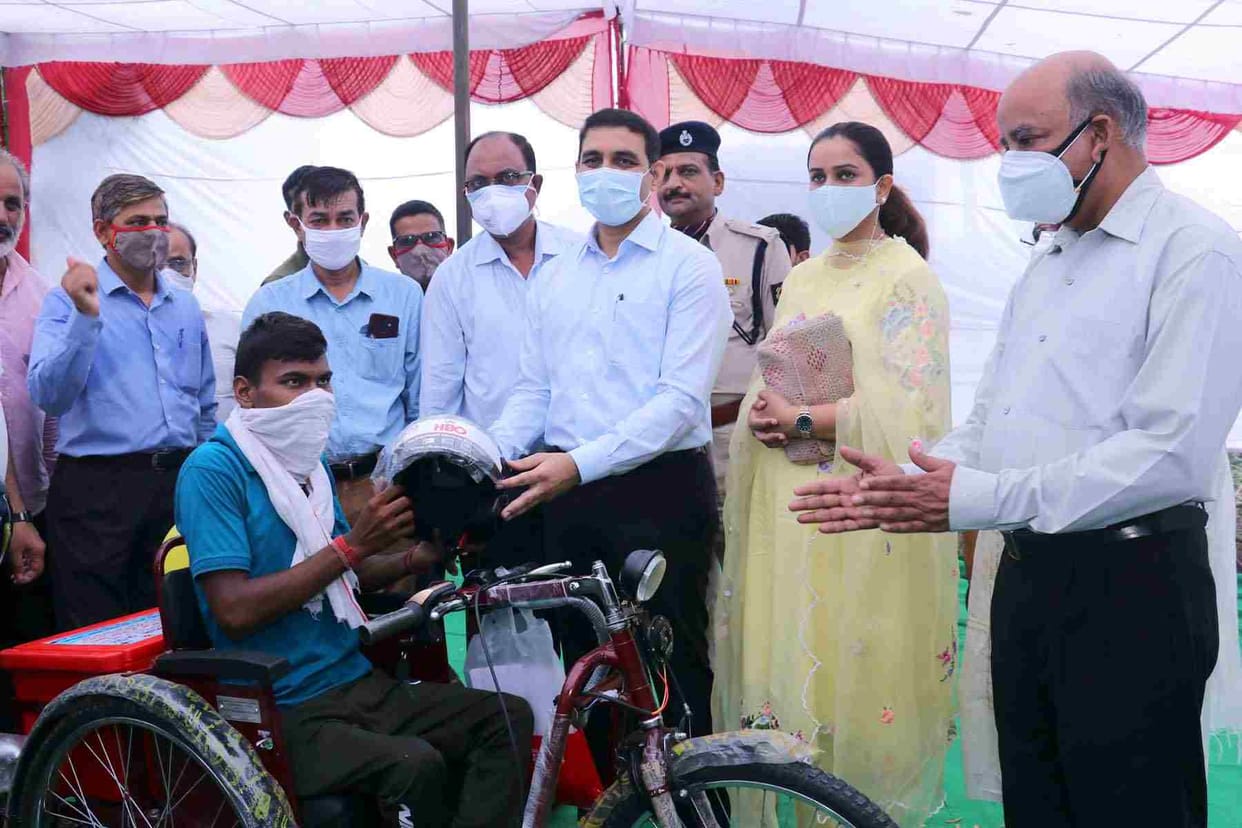 Distributed 420 accessories and battery operated tricycles to 353 differently-abled citizens