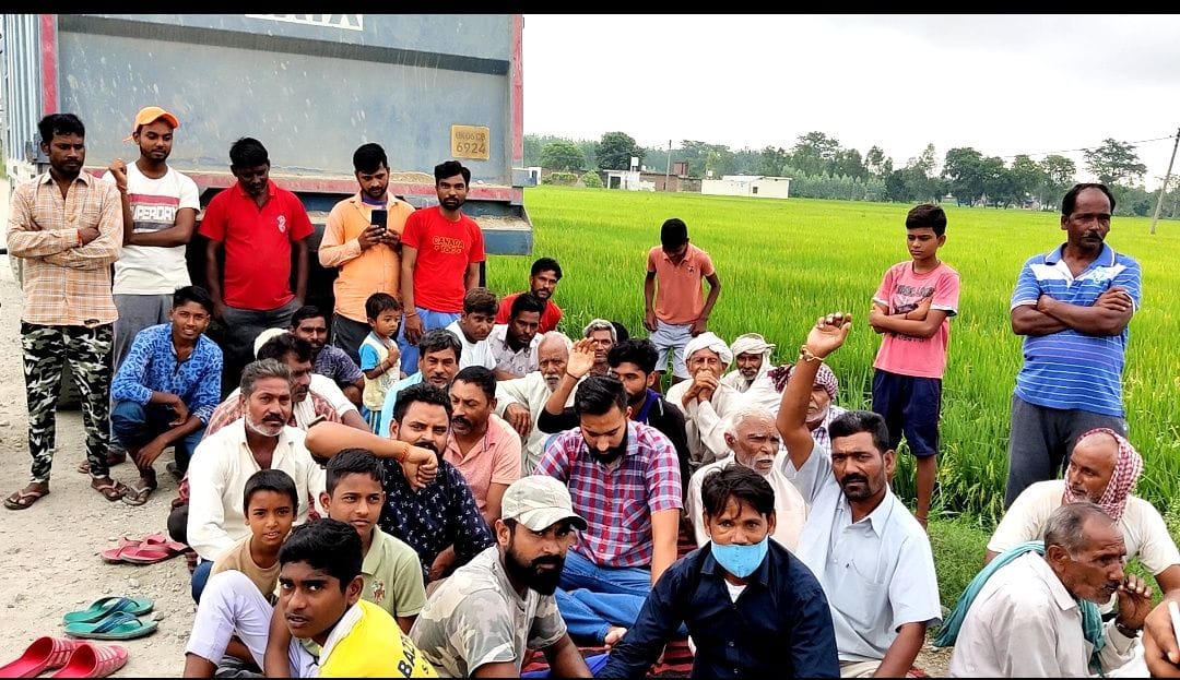Villagers protested.
