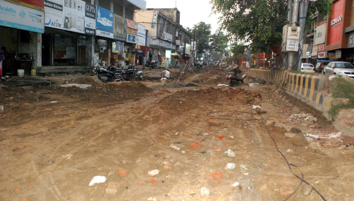 Broken road and flying dust, citizens are suffering
