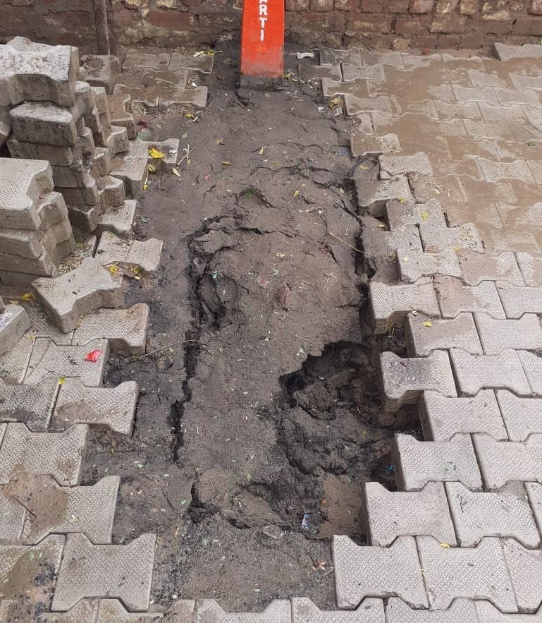 Street construction work completed two days ago, got sunk in the first rain