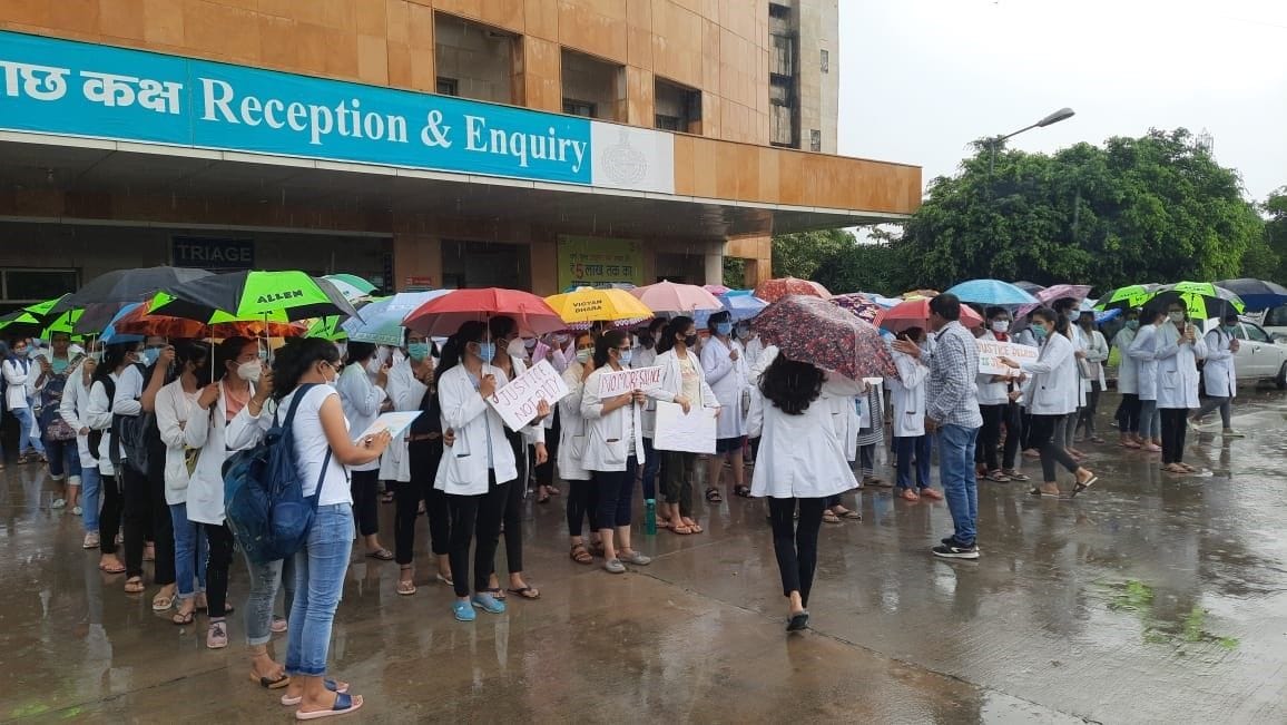 The girls were adamant on the dismissal of the accused professor, stood in the rain and demonstrated