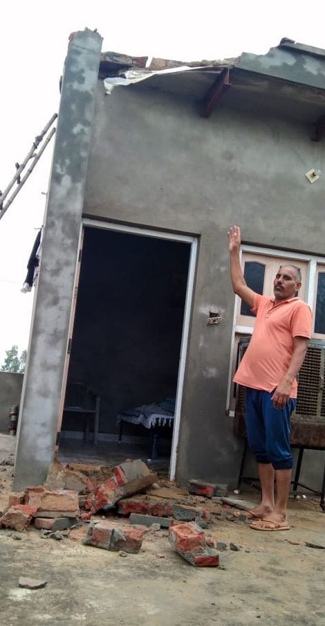 house damage to lightning strike in Ghuskani village