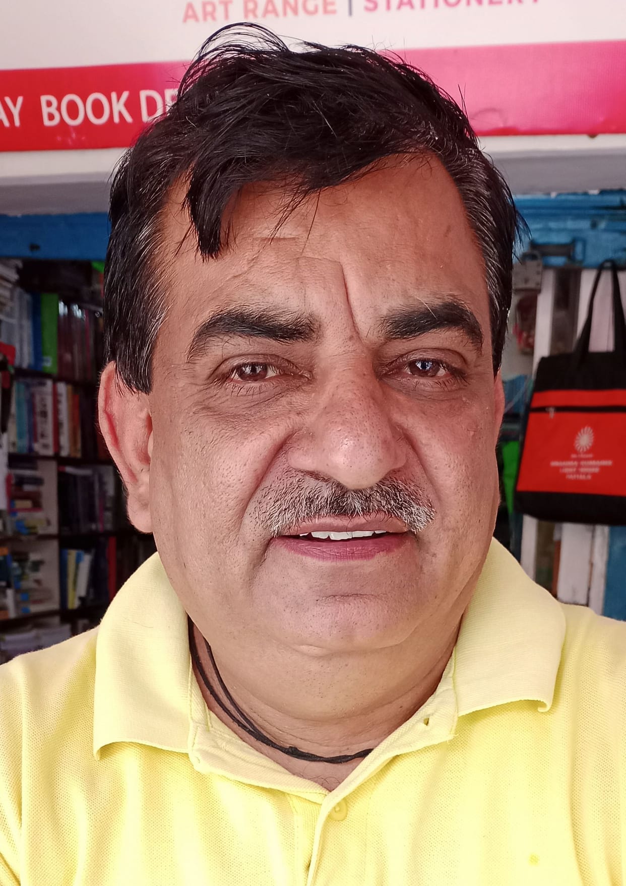 Sanjay Chugh providing free books to needy students