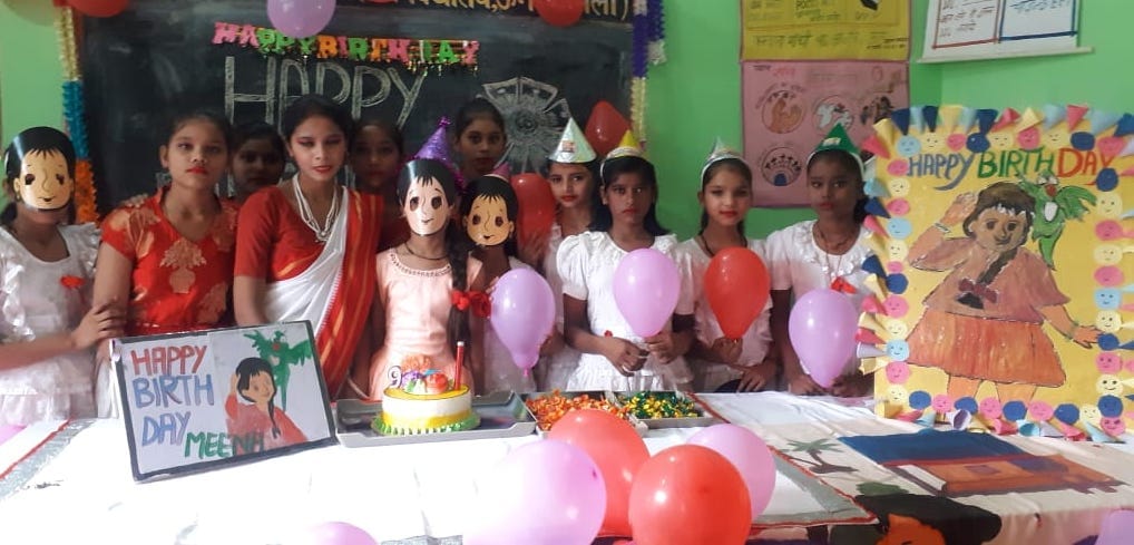 Celebrated Meena's birthday by cutting a cake