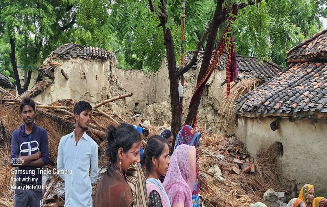 rain accident in jaunpur Neighbors wall fell on thatch in village brother dies and sister injured after buried in debris