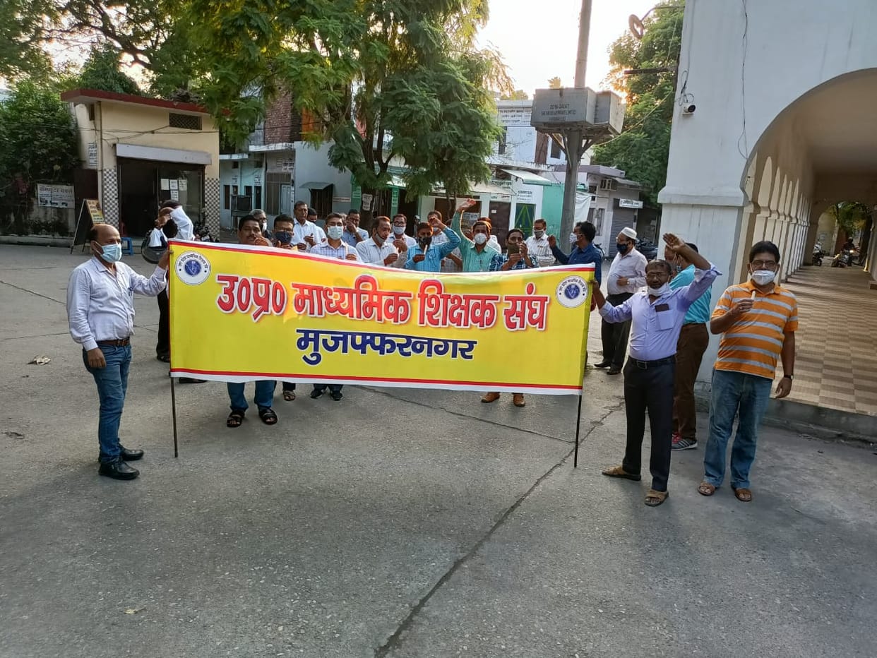 Candle march by teachers for demands