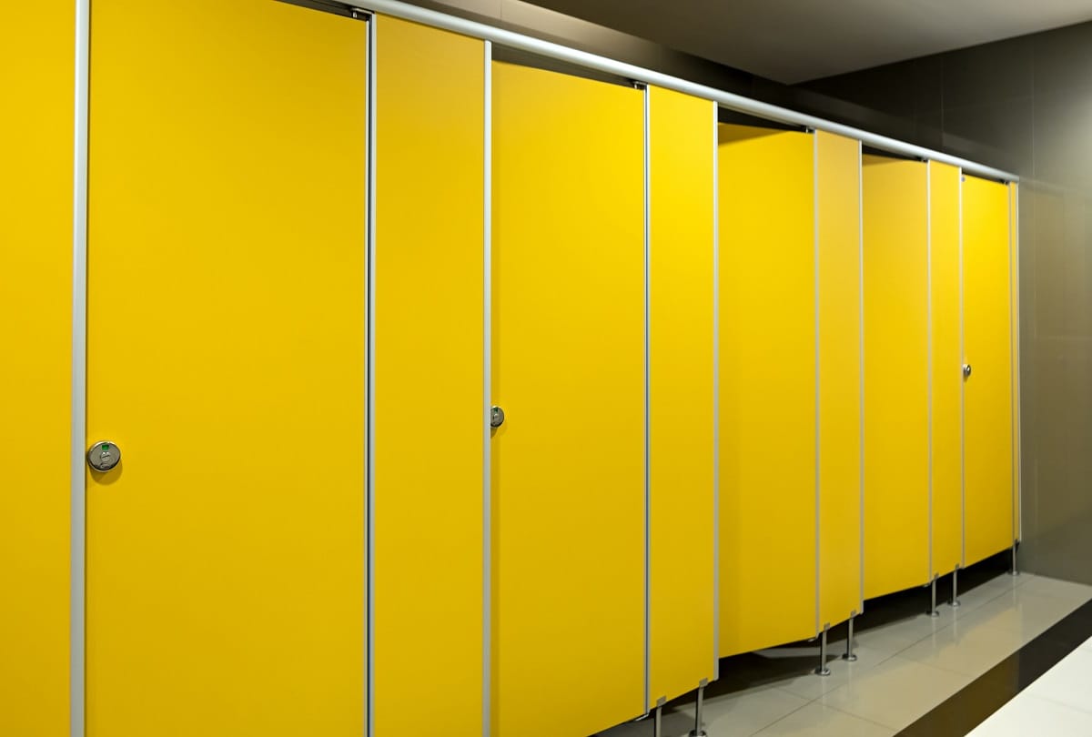 why toilets in office malls theatres are open from the bottom and top