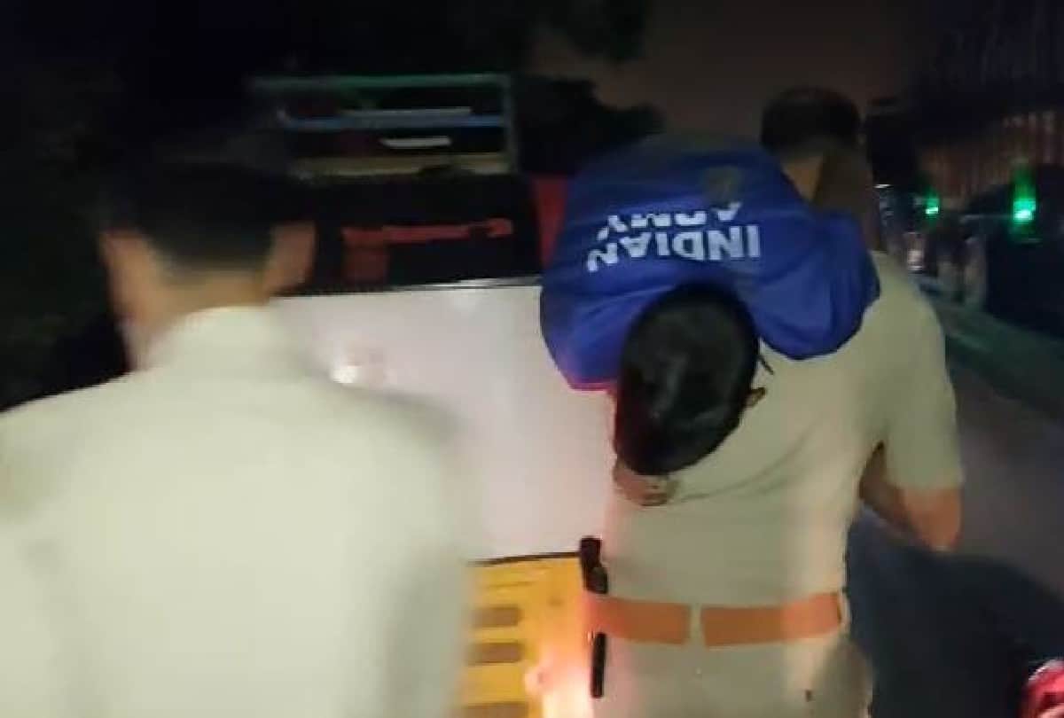 policeman running with carrying the injured man on his shoulder and saves his life