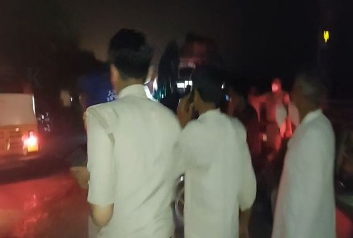 policeman running with carrying the injured man on his shoulder and saves his life