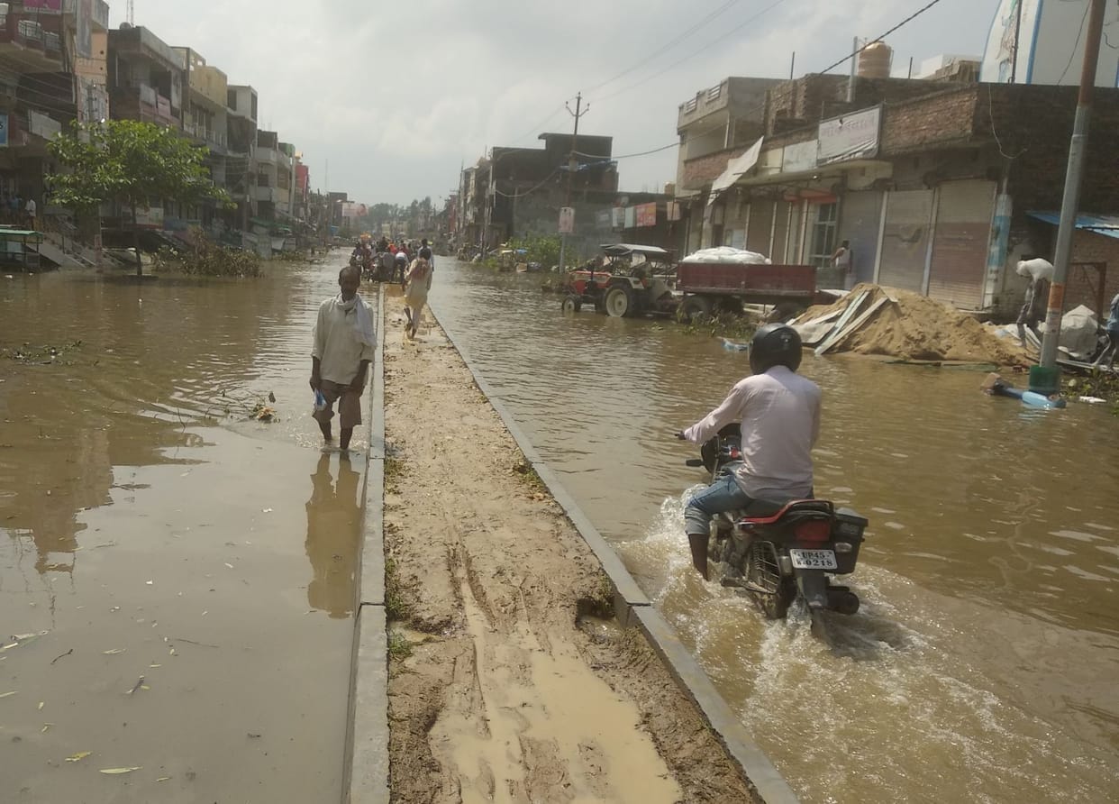 Water still filled with shops, houses as well as on major roads