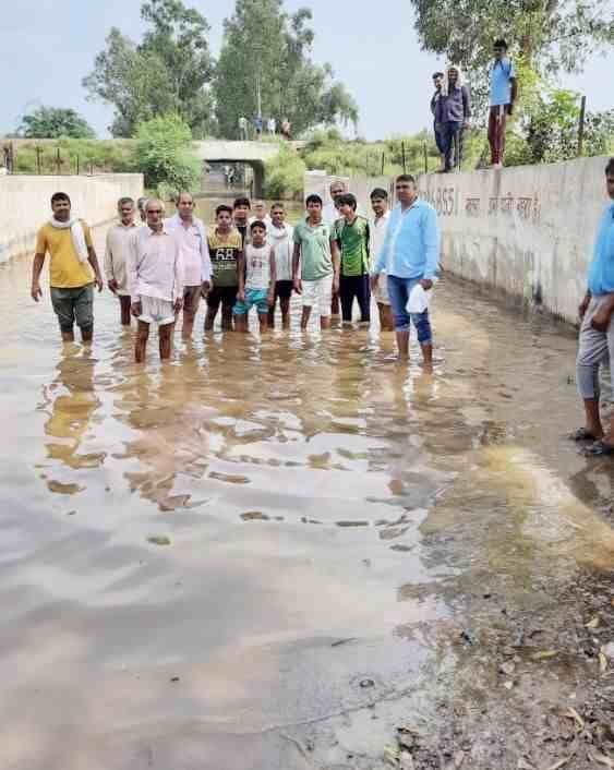 water filled in railway underpass