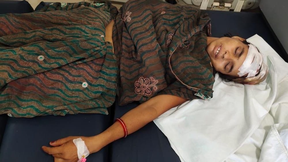 Woman shot in protest against excavation of school path, admitted