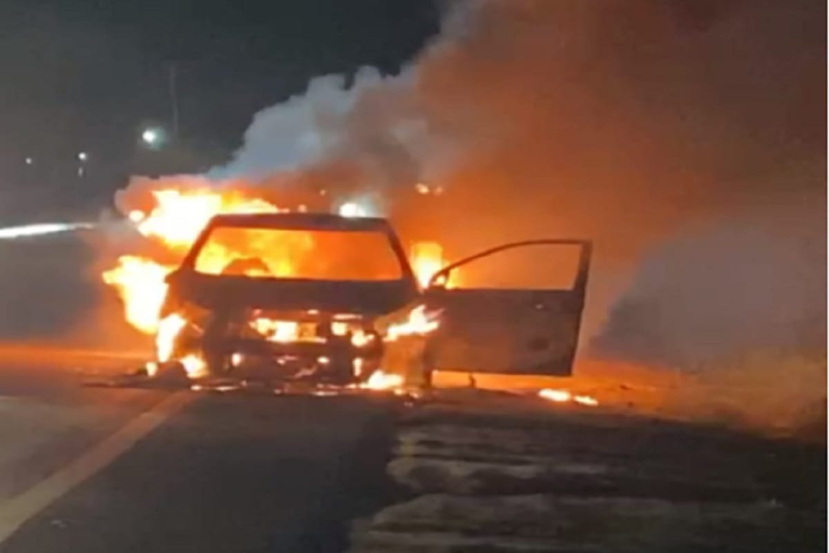 A car burnt on Delhi Dehradun highway in ModiPuram of Meerut