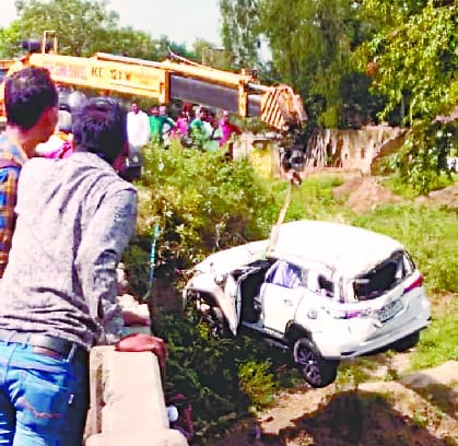 The car fell into the river when the driver took a nap