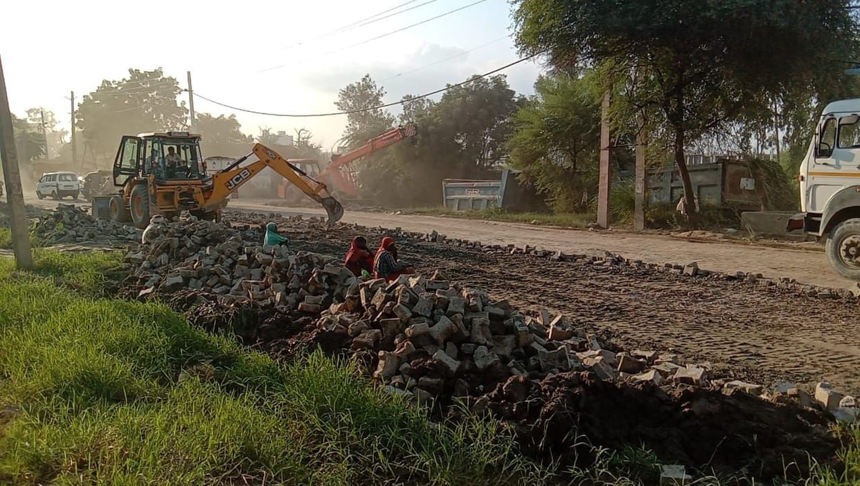Relief: Filled potholes on 20th mile-Bahadurgarh Highway