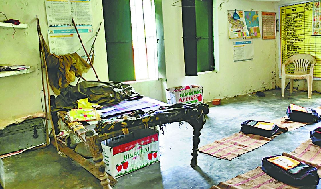 Education system in Chandauli Guruji cot in the school room children studying in the corridor