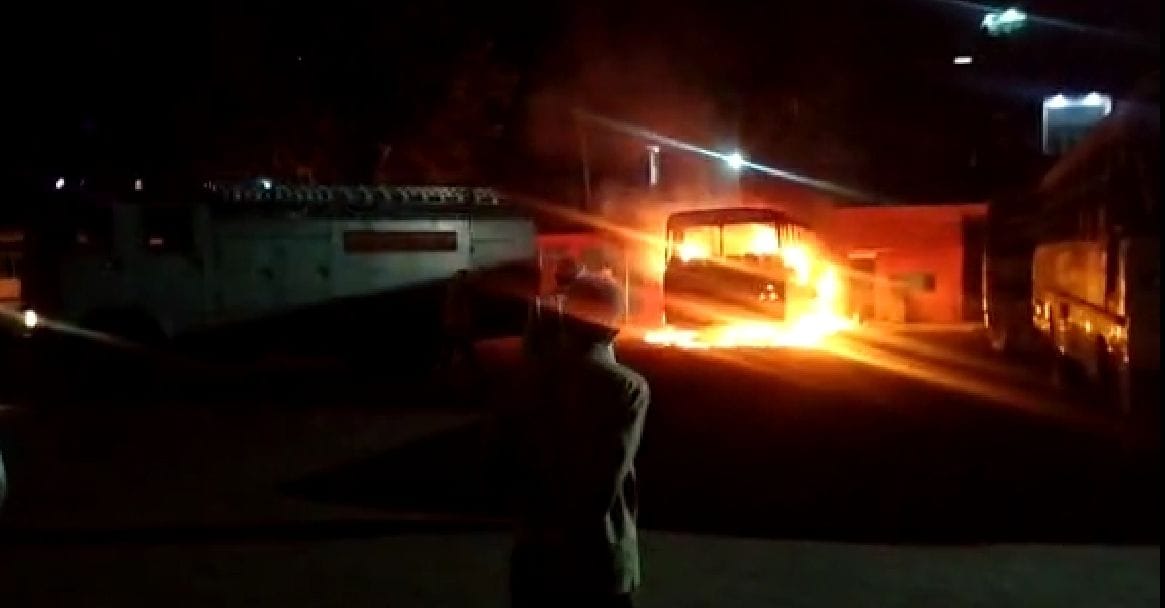 the roadways bus parked in the bus stand caught fire
