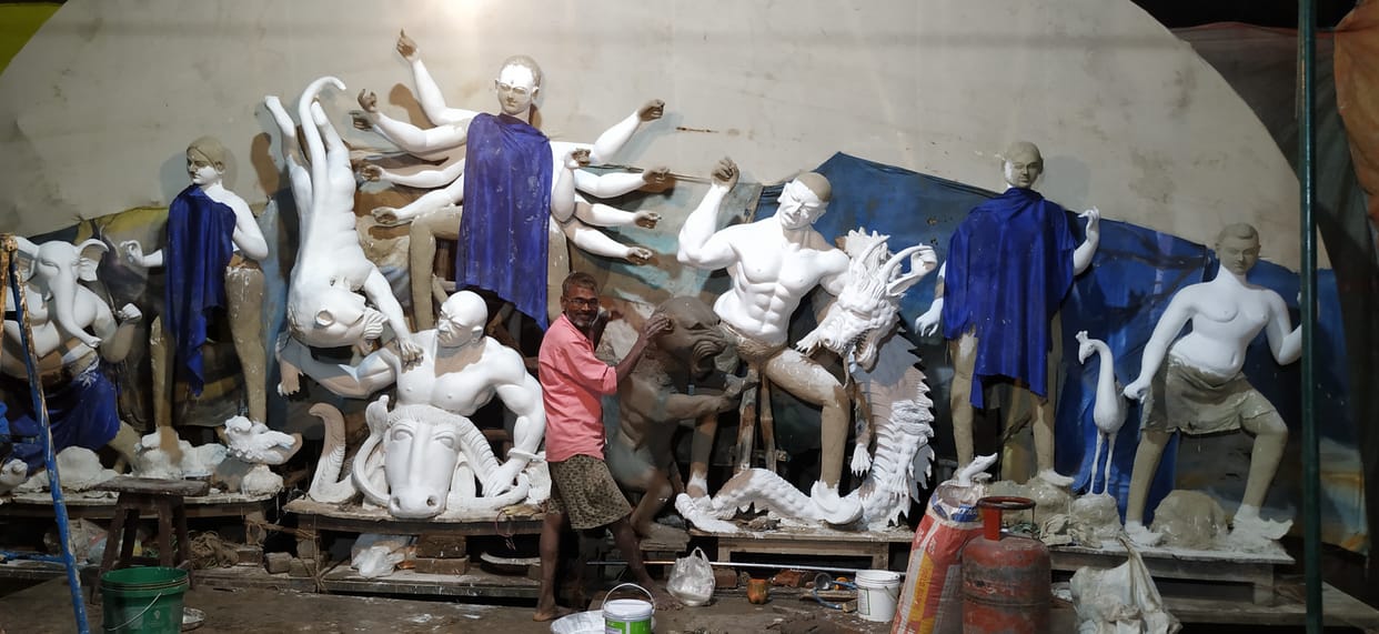 Artists engaged in finalizing the sculptures