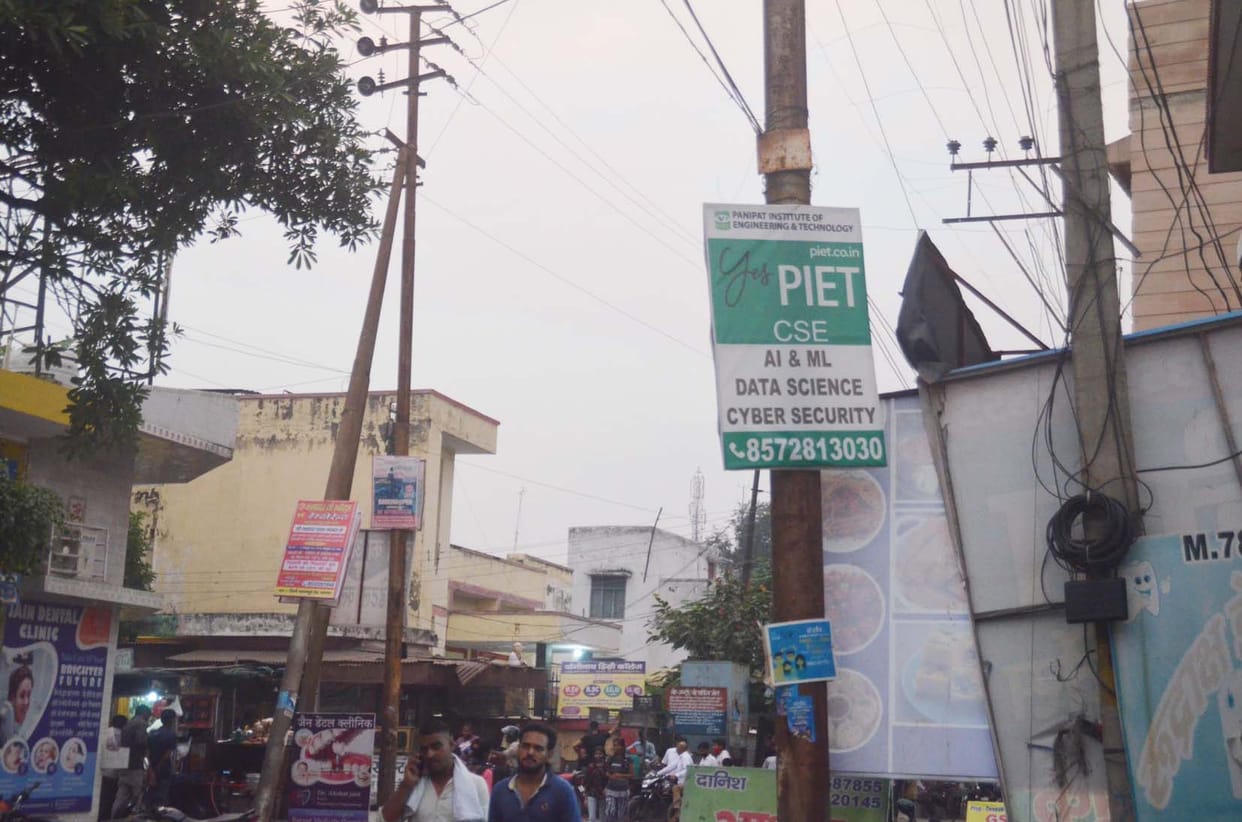 Hoardings and boards of leaders on electric poles
