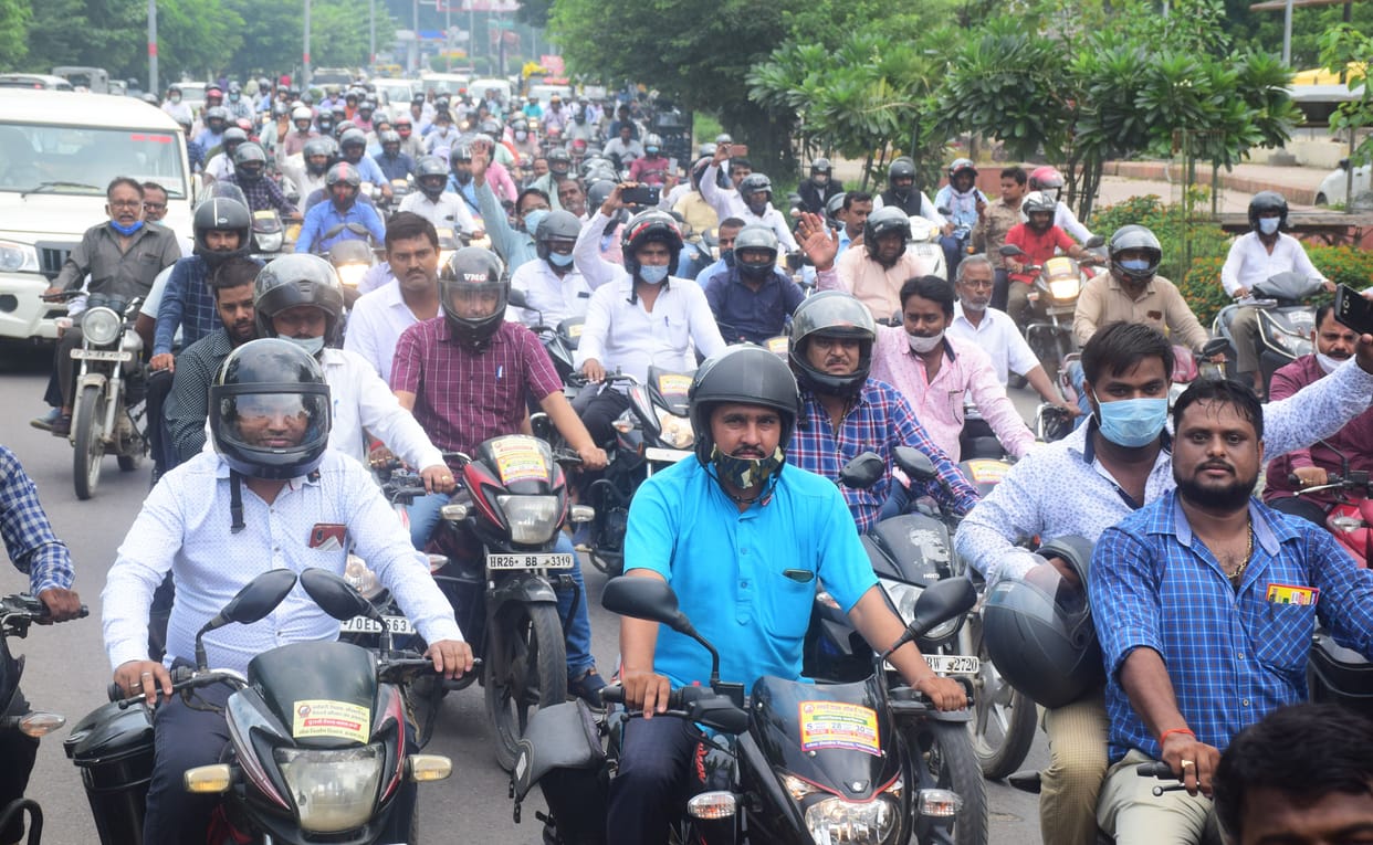 Employees organizations showed strength, took out motorcycle rally and sought old pension