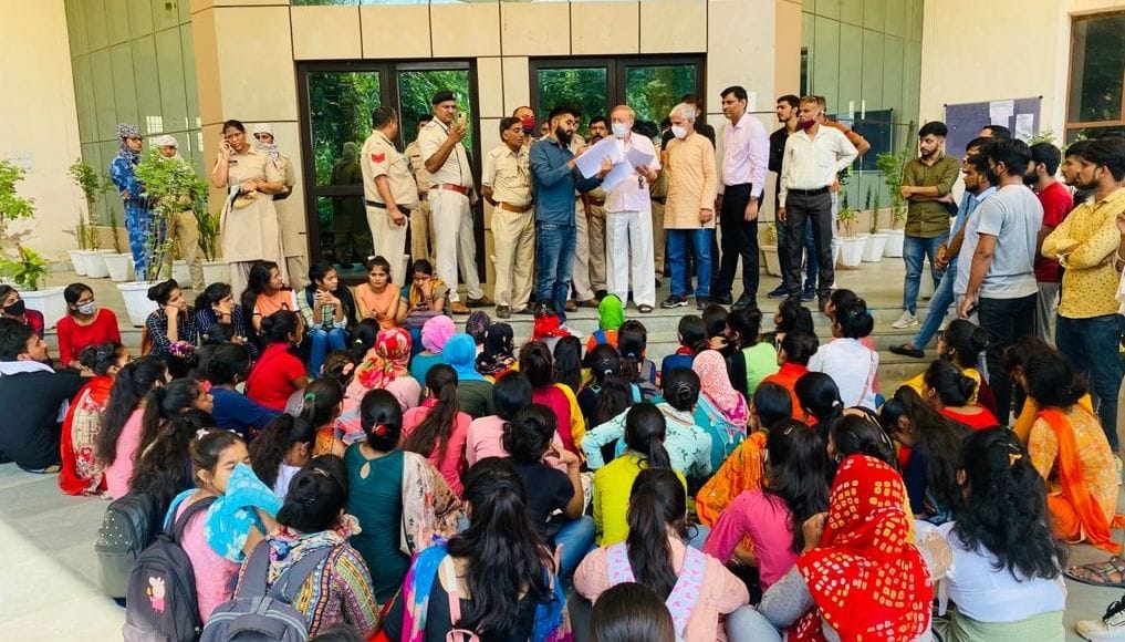 Students sitting on dharna alleging irregularities in examination results