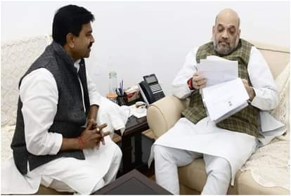 केंद्रीय गृह राज्यमंत्री अजय मिश्र टेनी के साथ अमित शाह।