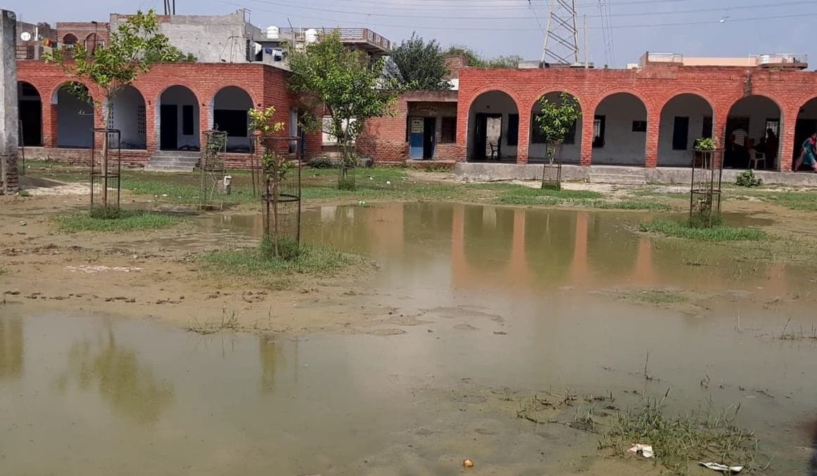 Water filled in Government Middle School premises, teachers and children are unable to reach the school