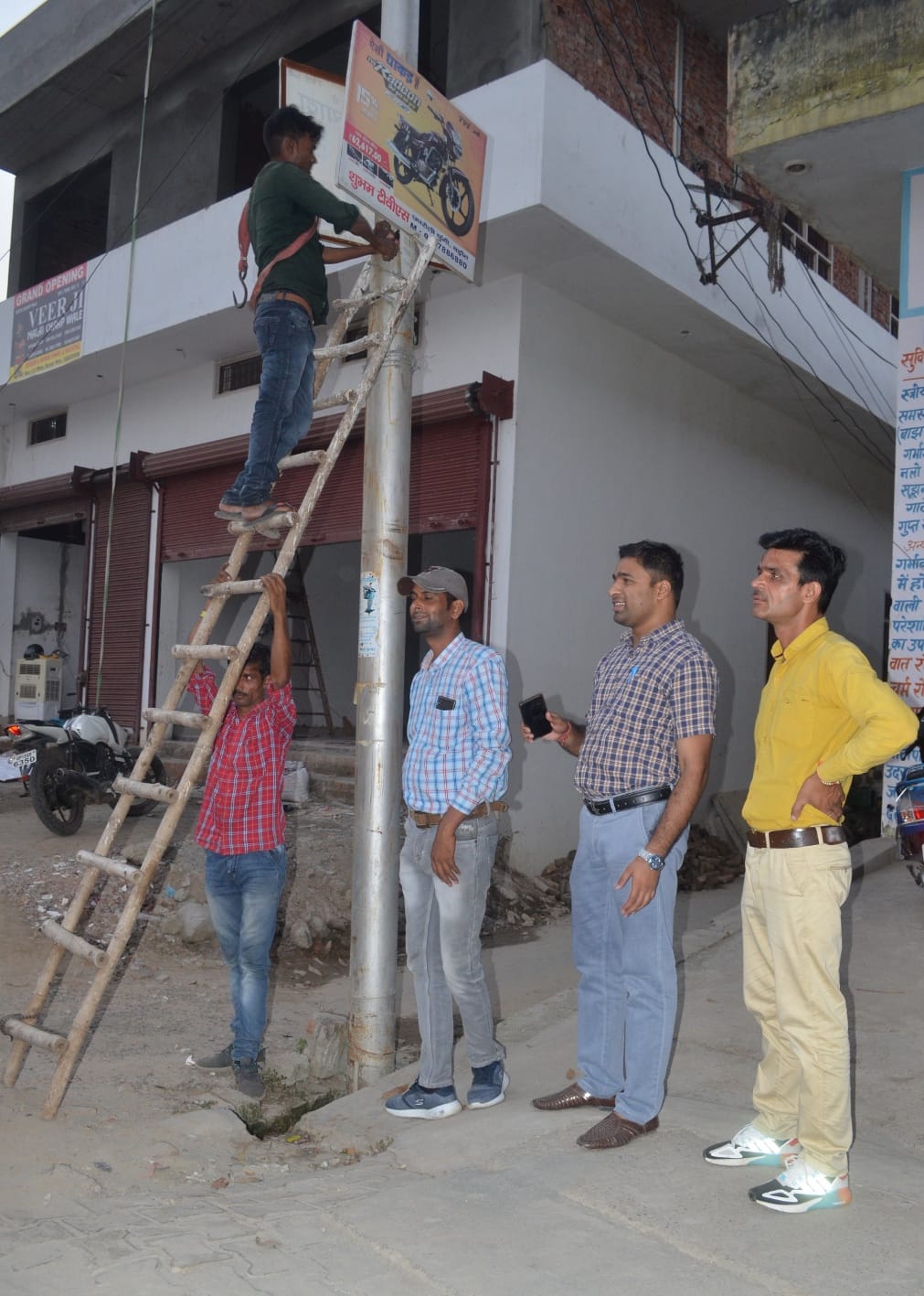 Illegal hoardings and boards broken with JCB