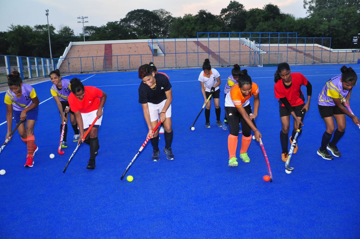Women hockey players will make a place in the state team by performing the game in the camp