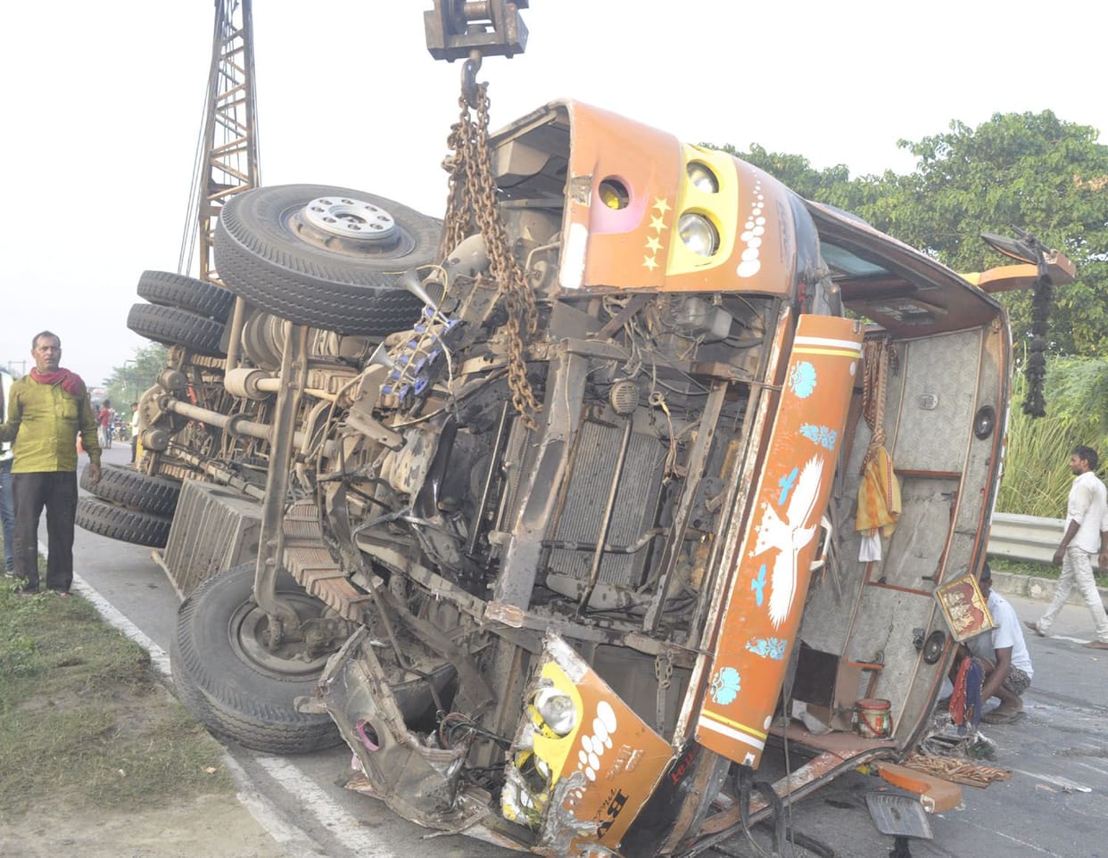 Bus overturns, 12 passengers injured