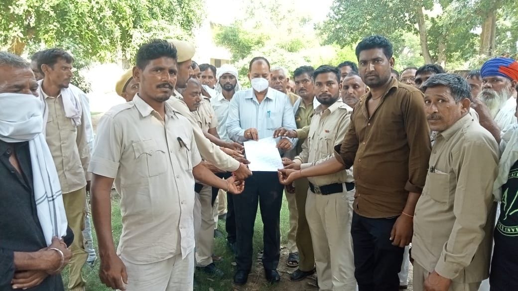 Watchmen demonstrated and submitted a memorandum to the Tehsildar