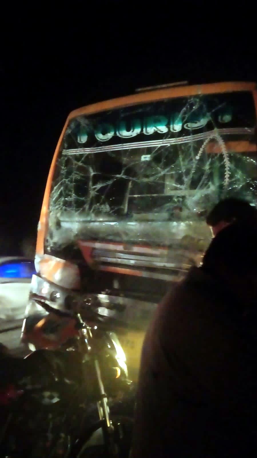 High speed private bus collided with truck, 14 passengers injured