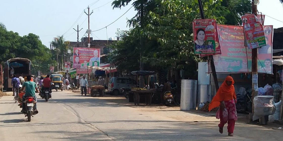 Illegal hoardings and banners are strewn with electric poles