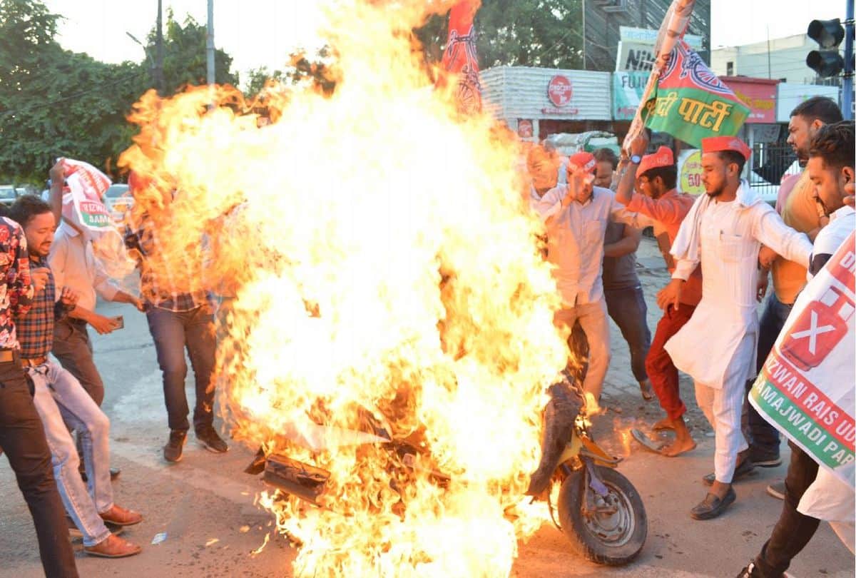 Samajwadi Party leader sets scooter on fire protest against petrol price hike in agra