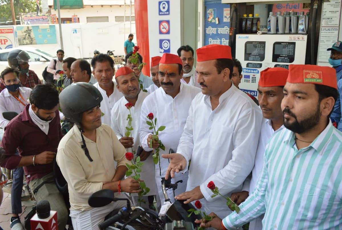 Samajwadi Party leader sets scooter on fire protest against petrol price hike in agra